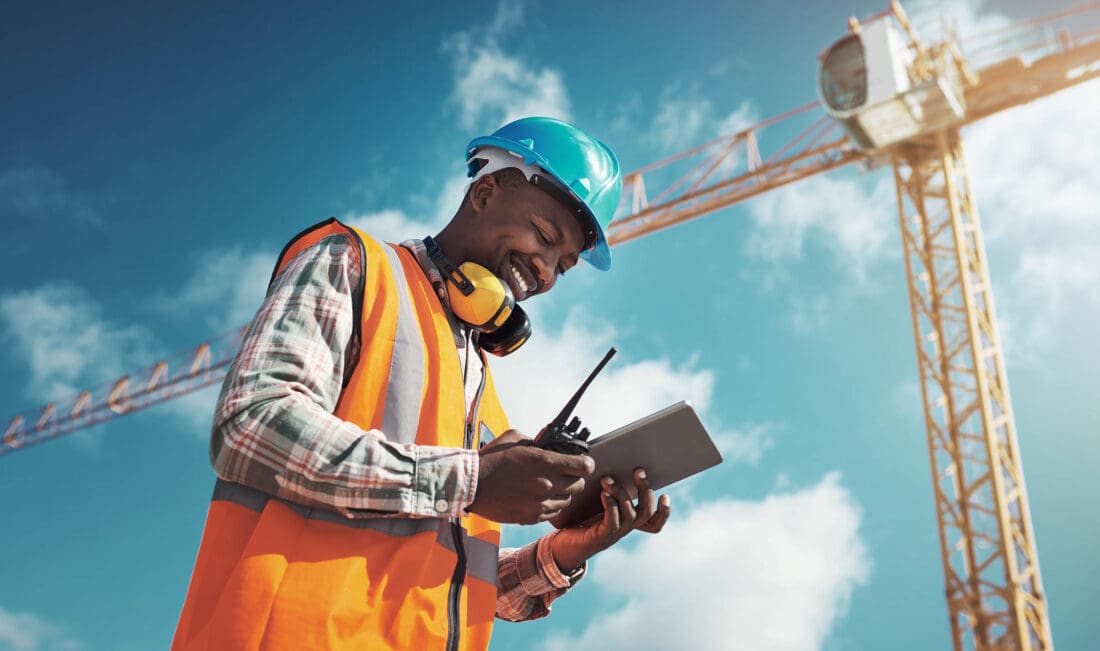 Gen Z and the Workforce Construction Worker Standing Under Crane